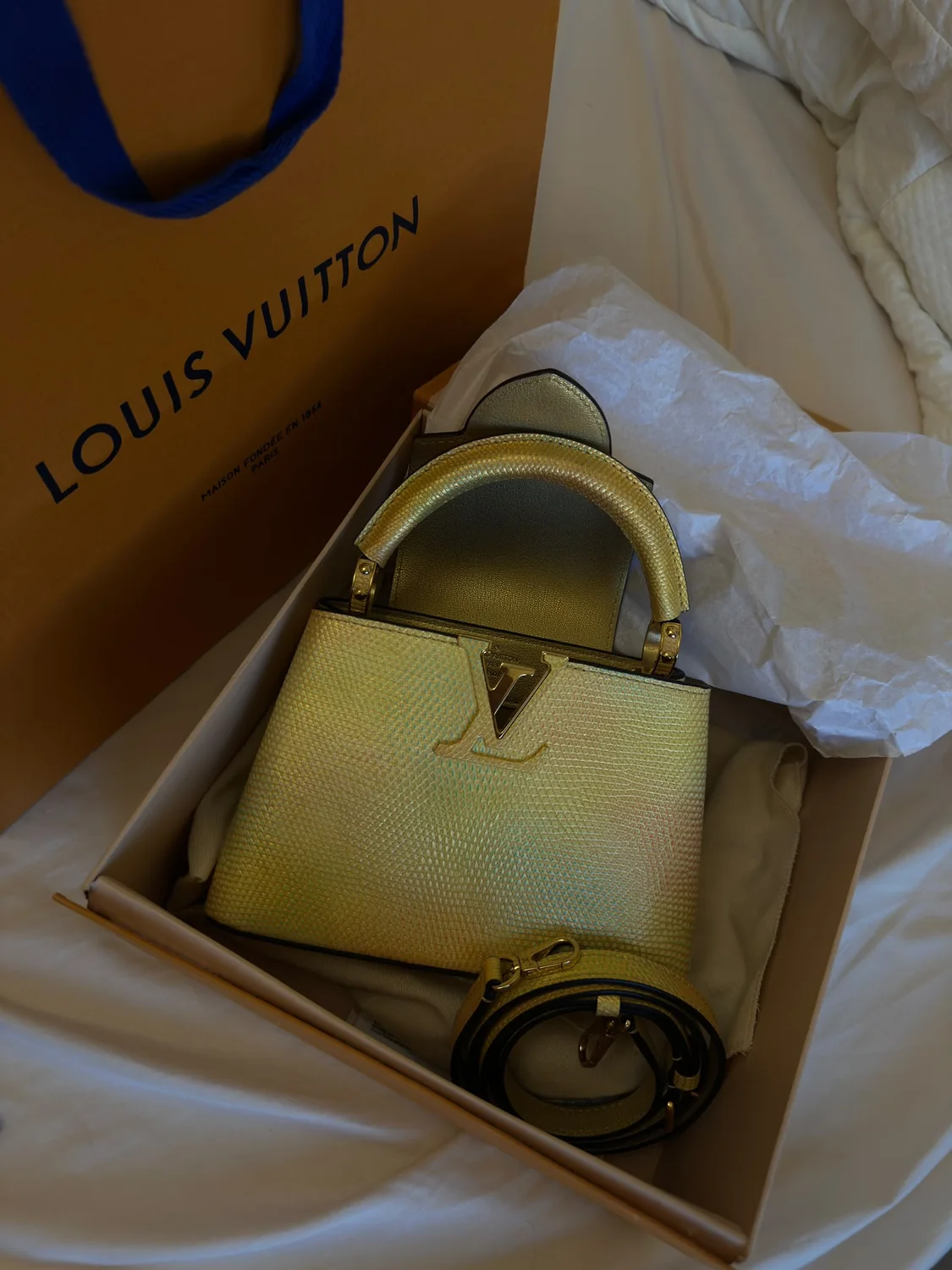 Gold designer handbag